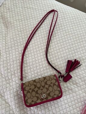 Coach Signature Canvas Crossbody with Fuchsia Trim and Tassel